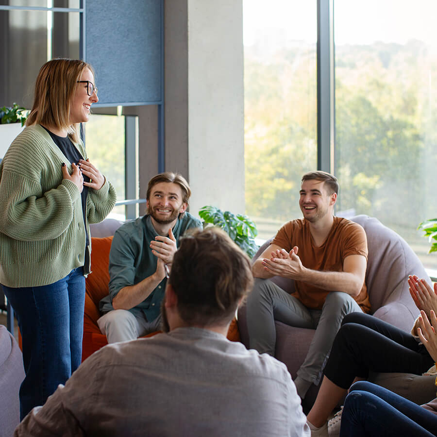 Group therapy - group of adults talking